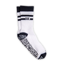 A pair of white crew socks with navy blue stripes and grip dots, featuring the text 'IAK.' on the upper cuff.