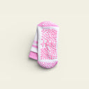 Close-up of IAK Blossom grip sock sole showing full-coverage PVC grip for pilates and yoga